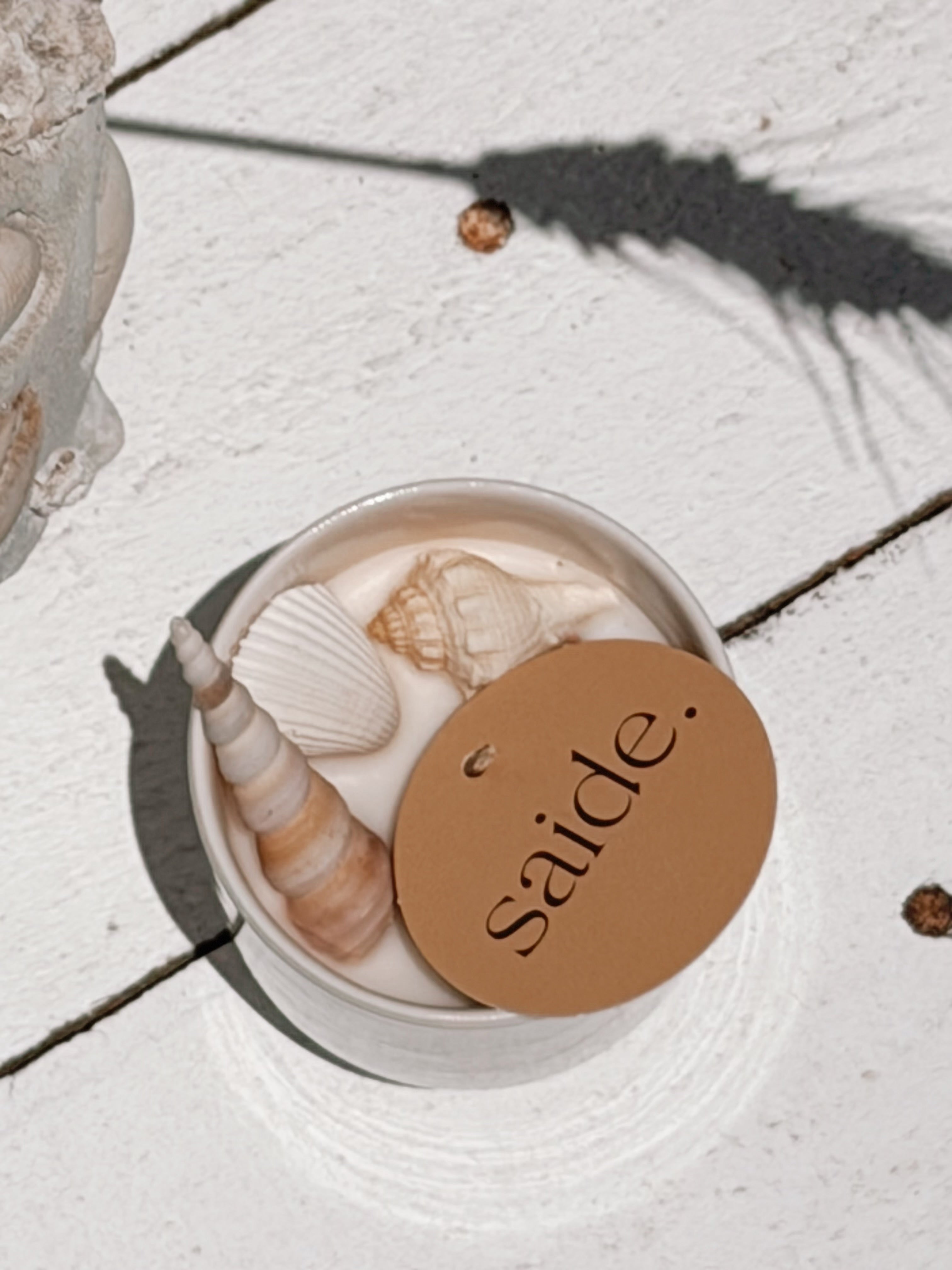 small seashell ceramic soy candle by | frangipani