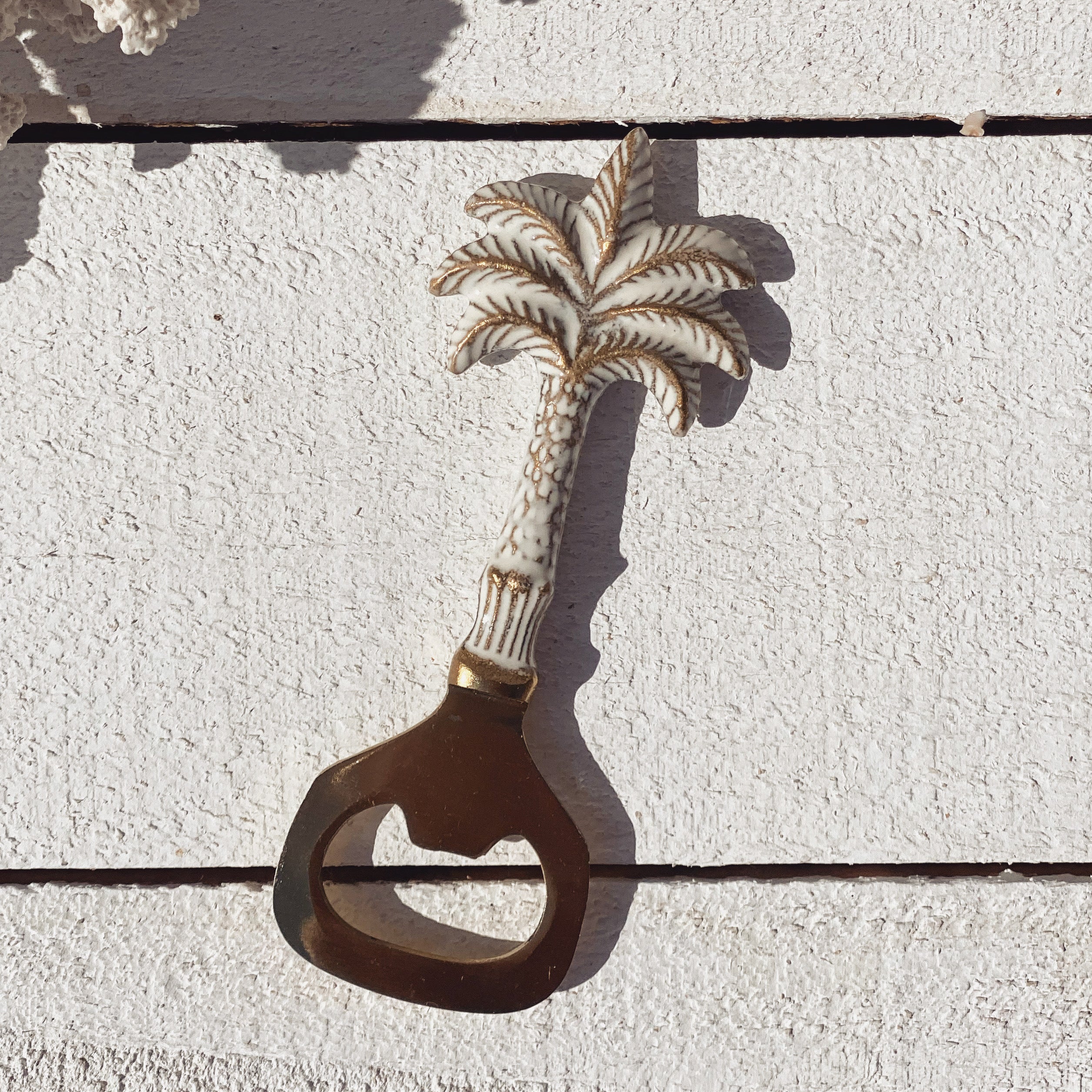 white palm tree bottle opener