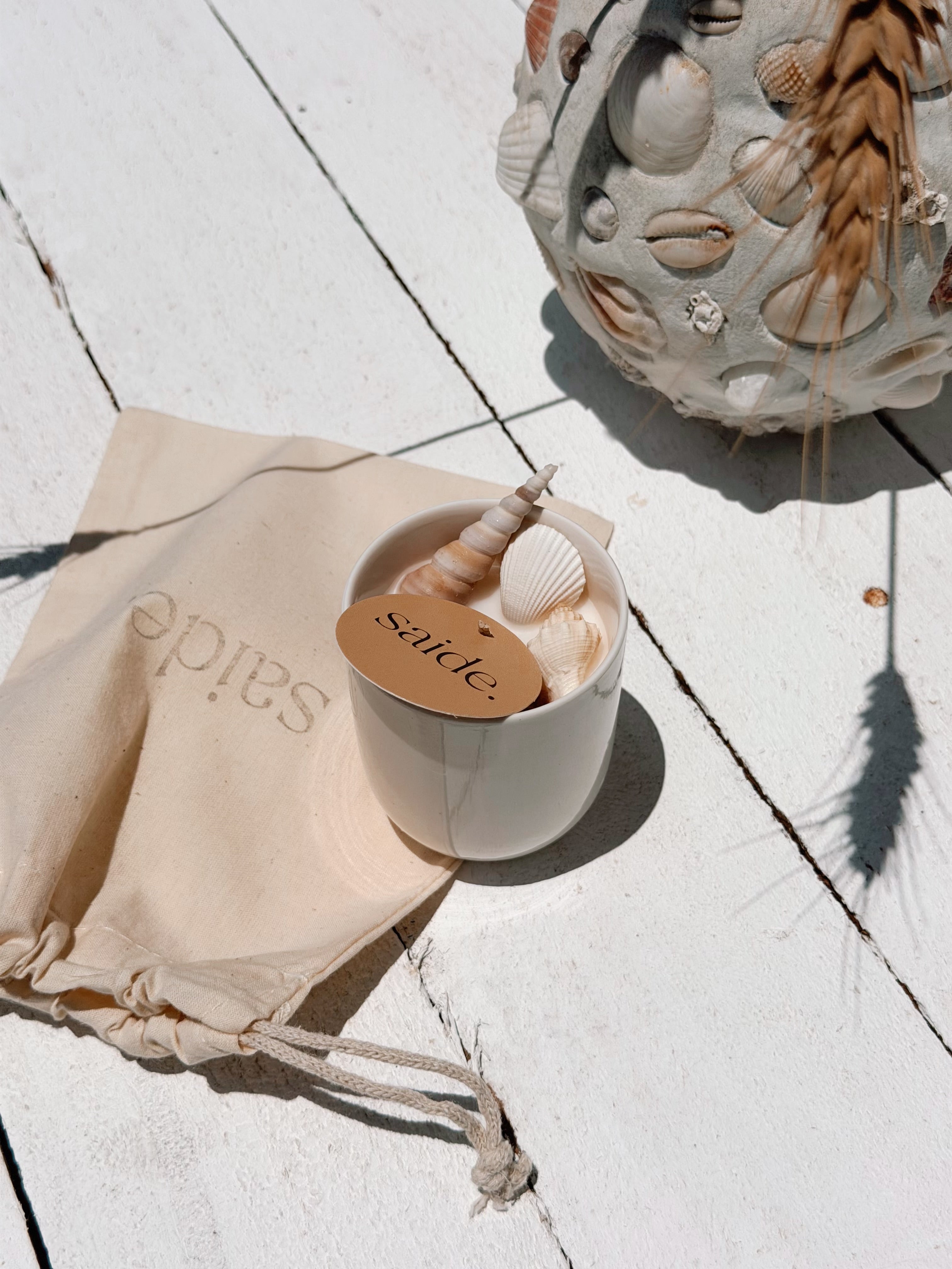 small seashell ceramic soy candle by | frangipani