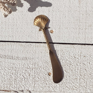 gold clam shell spreader